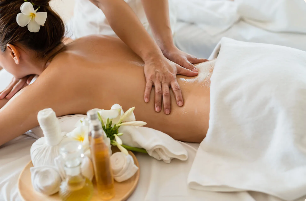 Professional deep tissue and hot oil massage treatment at Thai Village Massage and Spa.